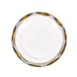 Glas met gele stippen