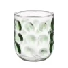 Glas met groene stippen